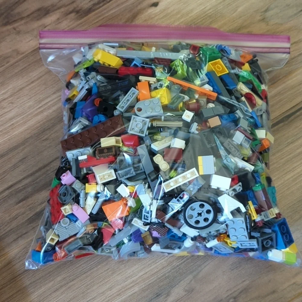 2 lbs Miscellaneous Lego pieces. Individual bagged miscellaneous Lego pieces.